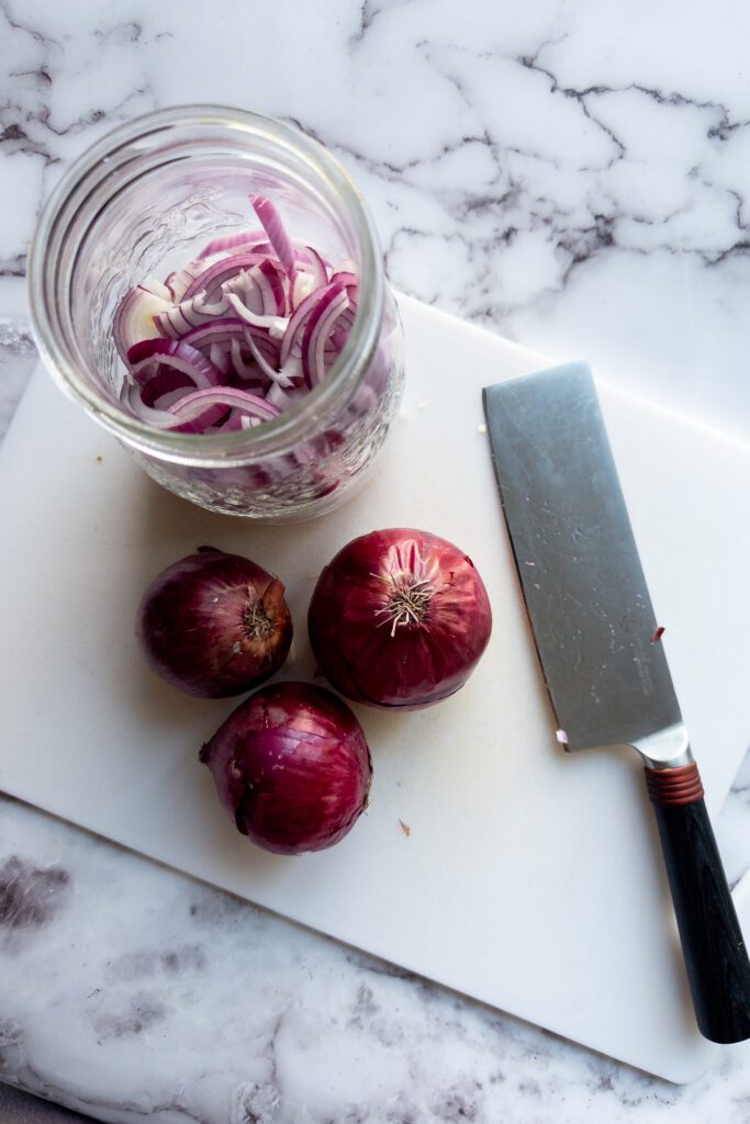 red onions cut in slices and placed in a jar