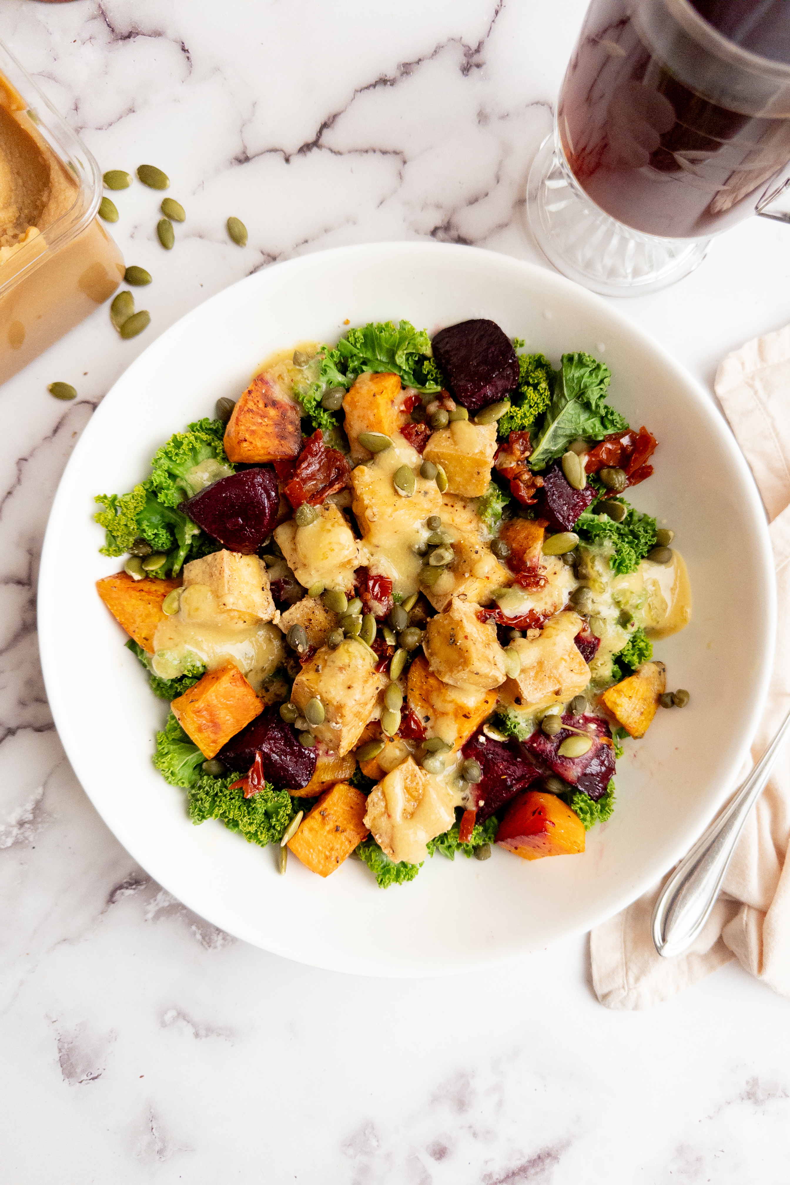 Veggie bowl with sweet potato, beets, tofu and miso gravy